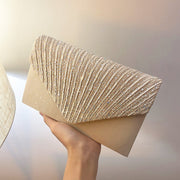 Bolso Golden clutch de mano o bandolera
